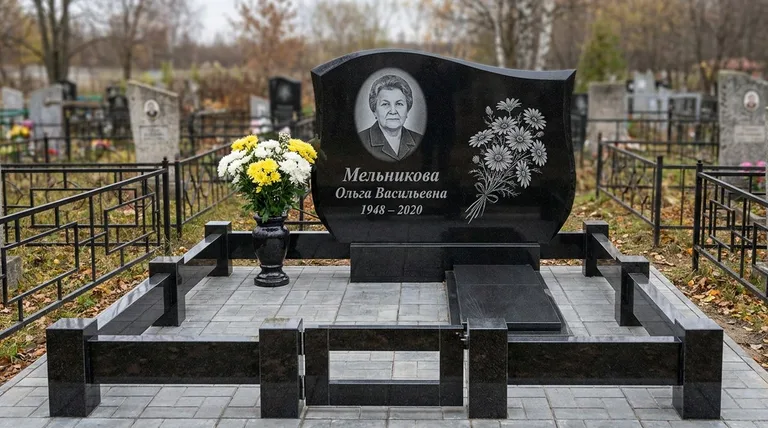 Памятник с гравировкой ромашек — выполненная работа «Мельникова» в Санкт-Петербурге