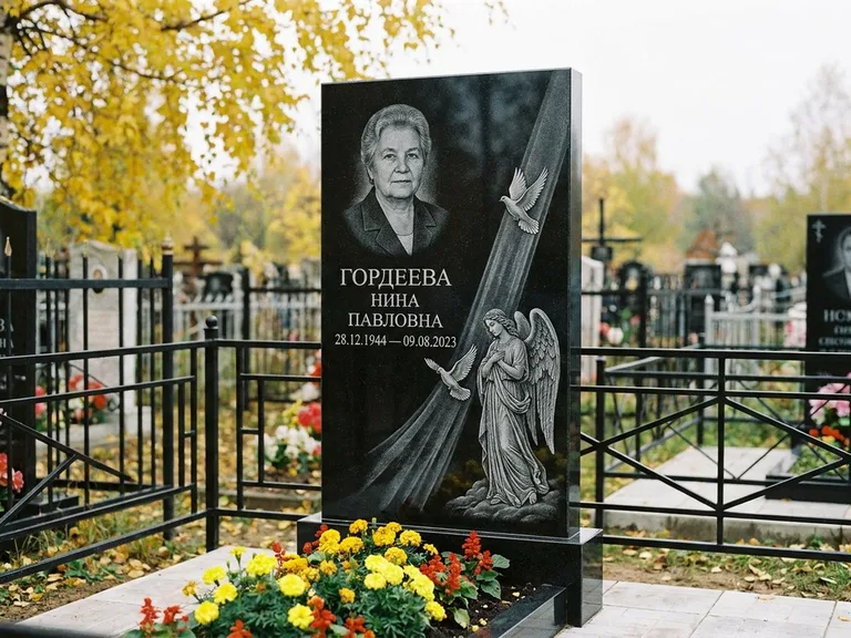 Памятник с гравировкой ангела — гравировка ангела с голубем по диагонали стелы, работа «Гордеева» в Санкт-Петербурге