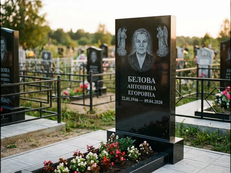 Памятник с гравировкой ангела — белая гравировка скорбящего ангела над портретом, работа «Журавлёва» в Санкт-Петербурге