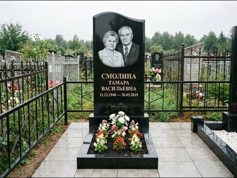 Гравировка портрета на чёрном граните — выполненная работа 10 в Санкт-Петербурге