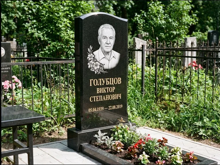 Гравировка портрета на чёрном граните — выполненная работа 13 в Санкт-Петербурге